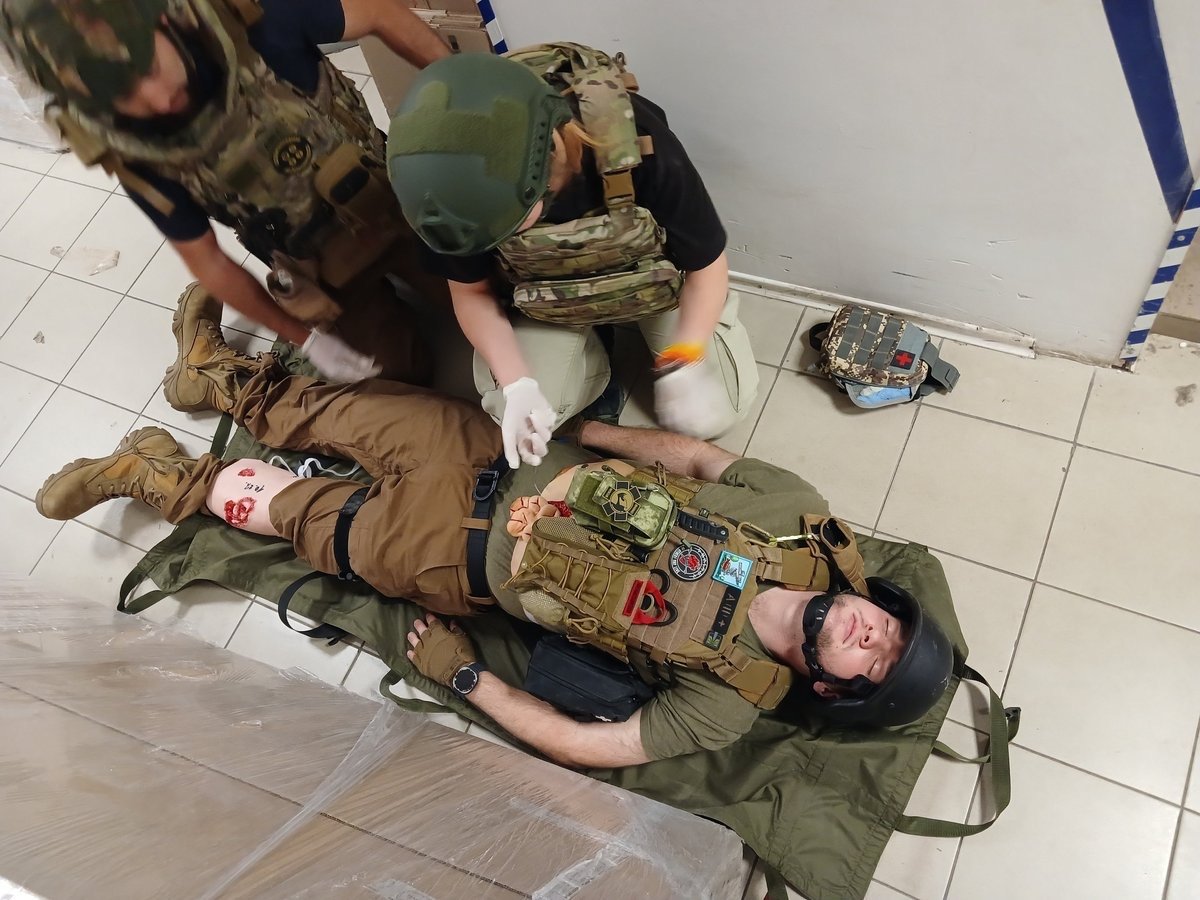 Trainees practising casualty care